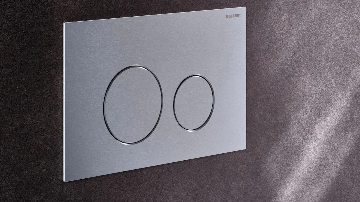 Geberit Sigma40 ronde · photographie fabricant, plaque et matières de la salle de bains.